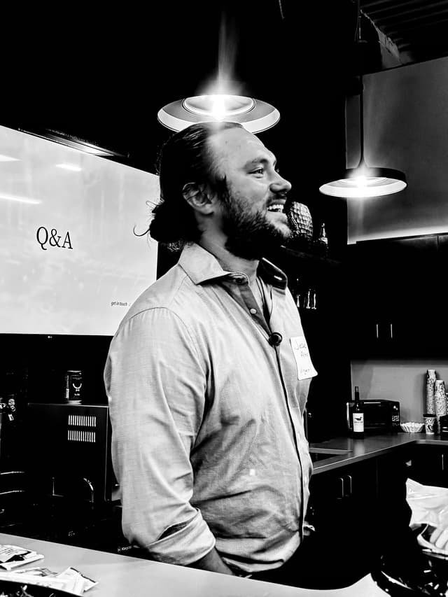 Jesse Alton speaking at a professional event